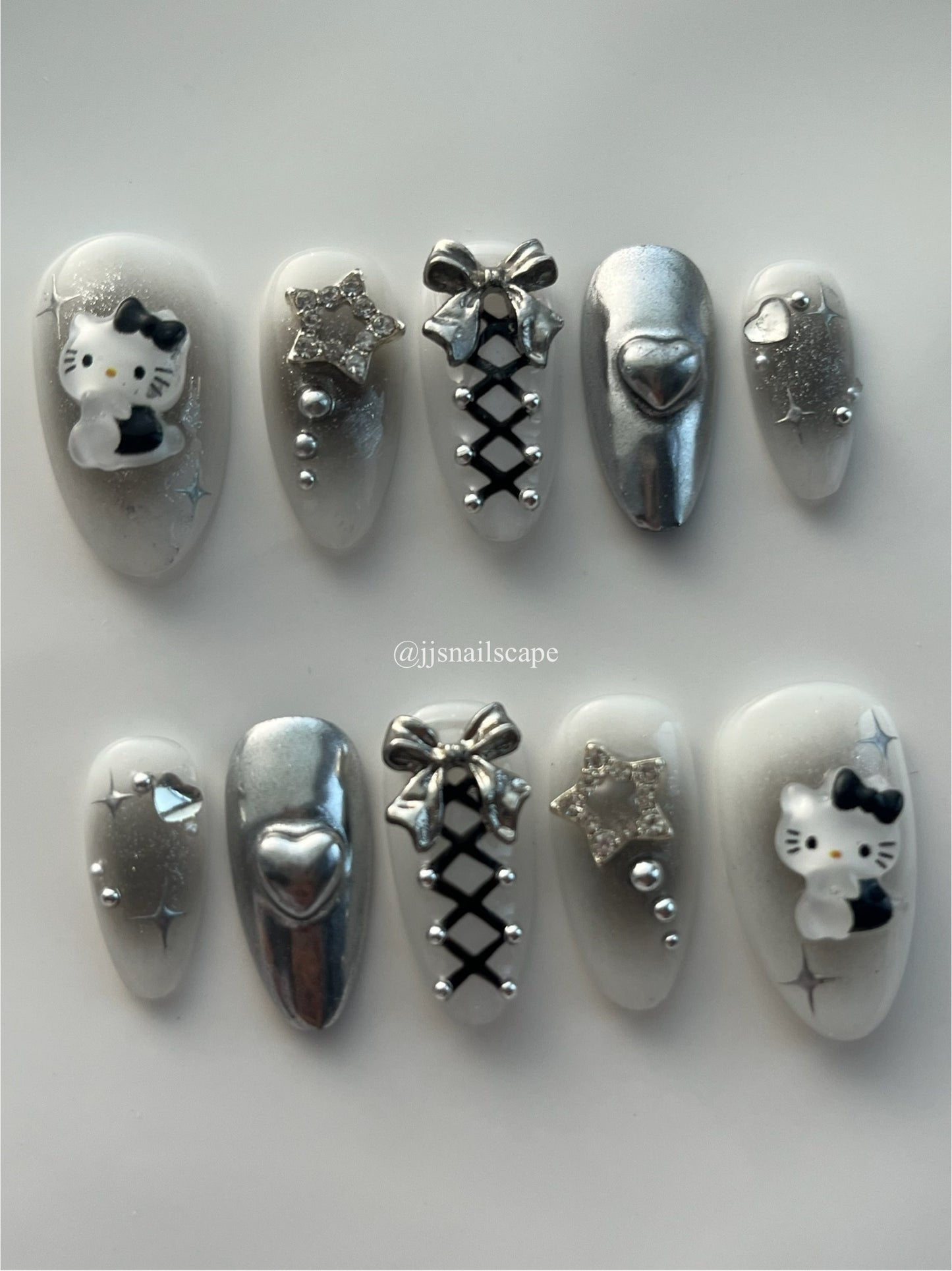 Silver Chrome Hello Kitty Nails